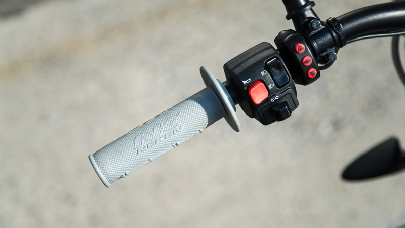 The red “up” and “down” switches are how you cycle through the bike’s various maps.